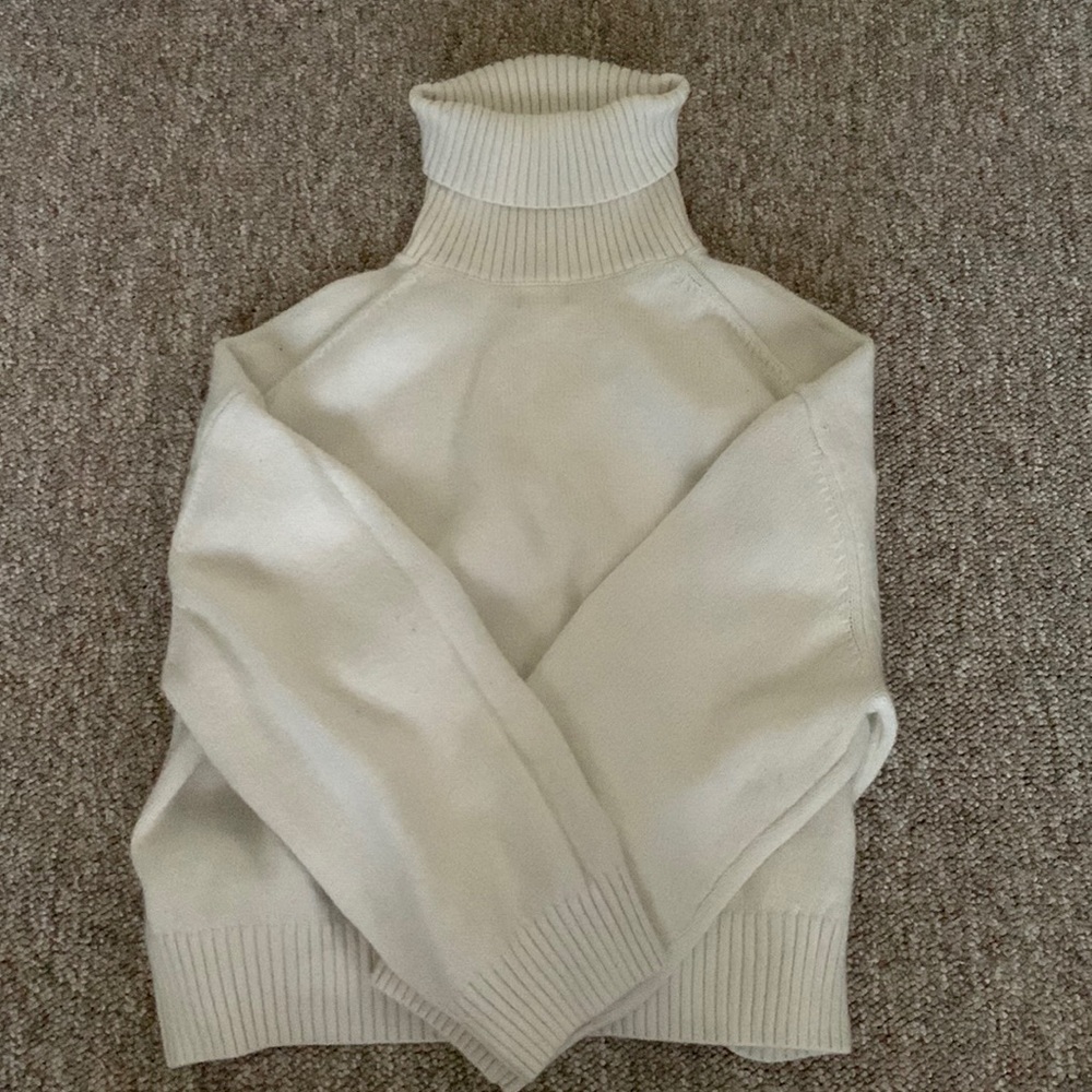 White turtleneck sweater